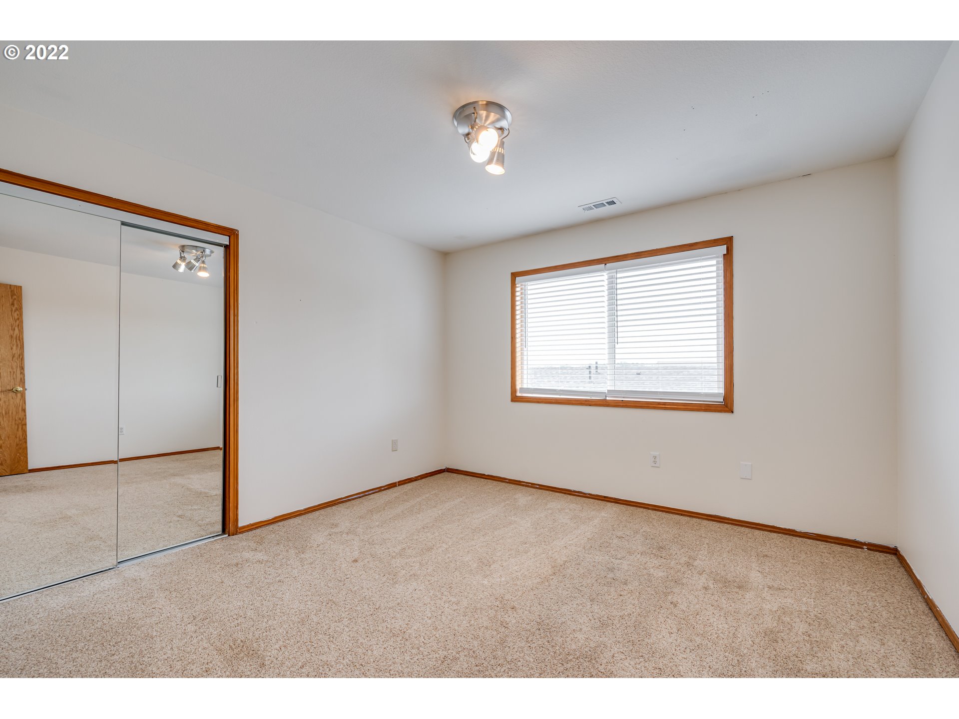 34 Depot Street Ridgefield, WA 98642 - Photo 21 of 32 a view of an empty room with a window