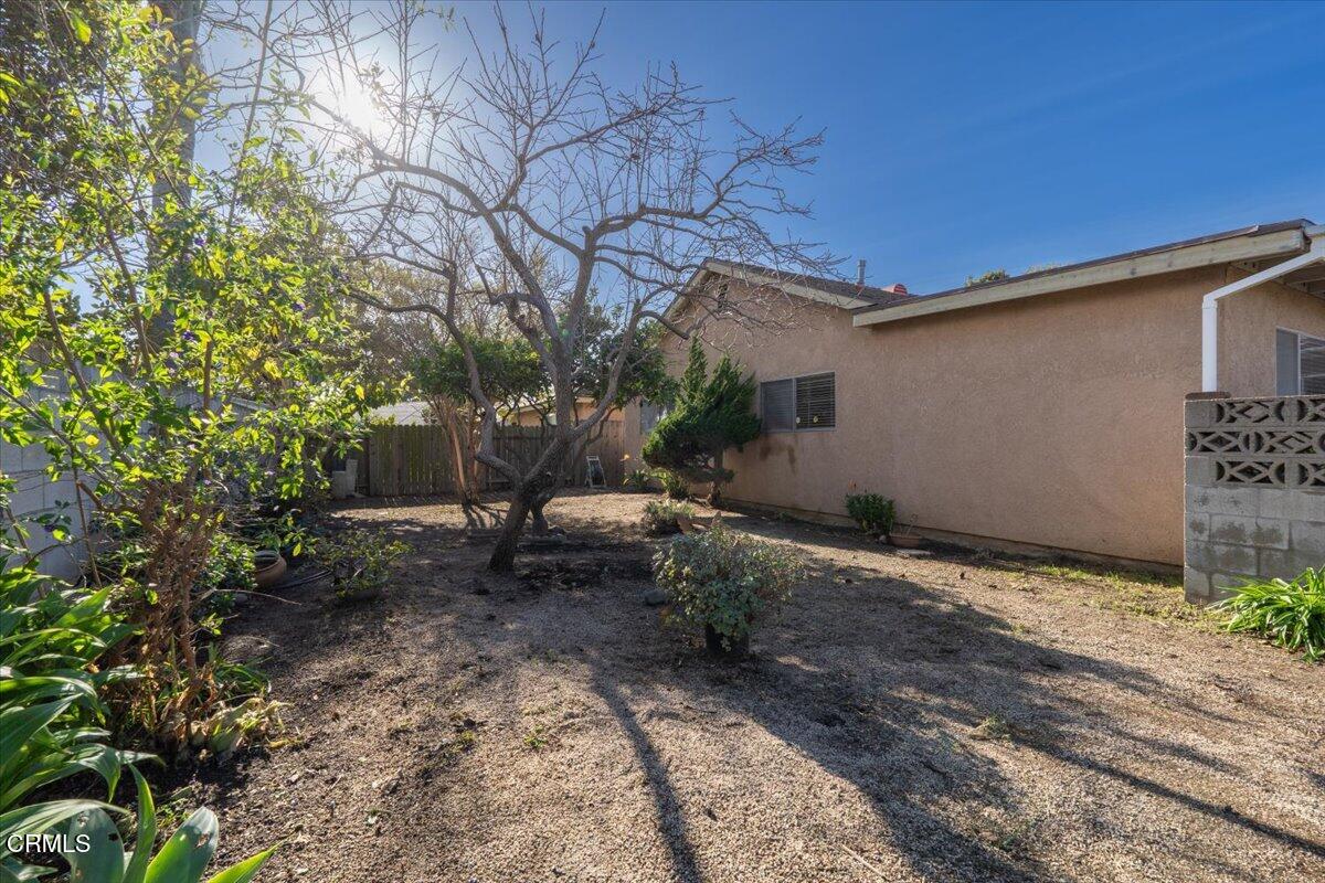 4800 Halsey Way Oxnard, CA 93033 - Photo 17 of 18 a backyard of a house with table and chairs