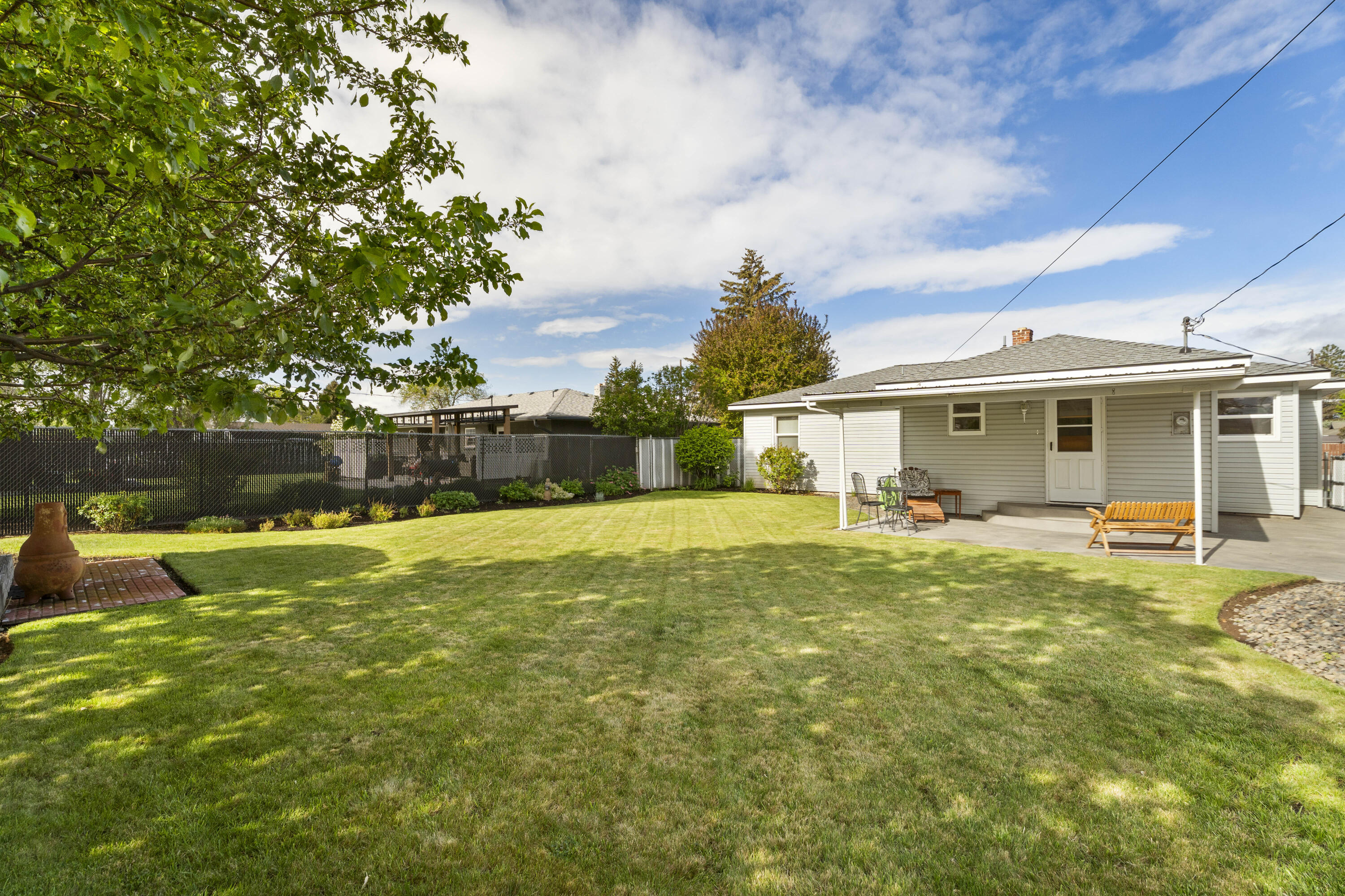 946 Southwest 13th Street Redmond, OR 97756 - Photo 37 of 49 a view of a house with a backyard