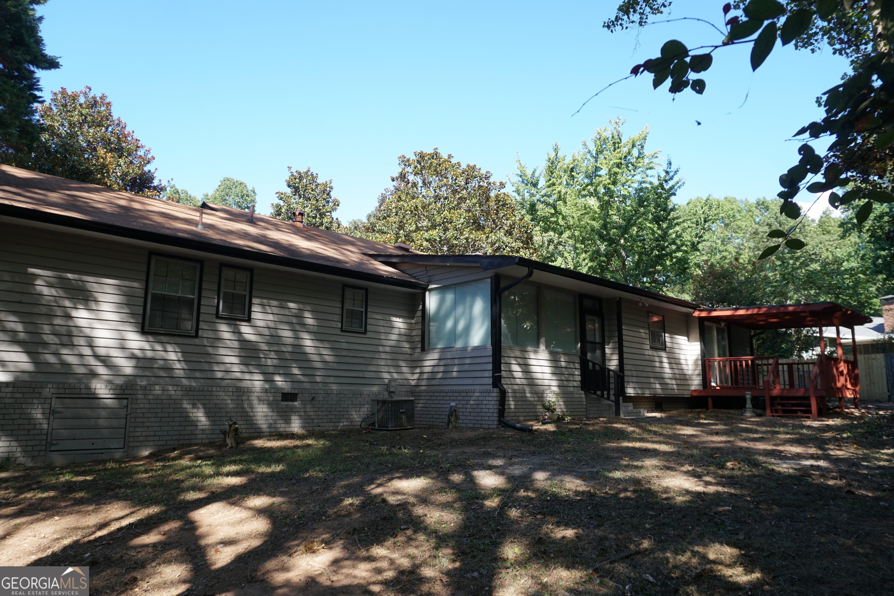 9243 Seminole Road Jonesboro, GA 30236 - Photo 37 of 40 a front view of a house with a yard