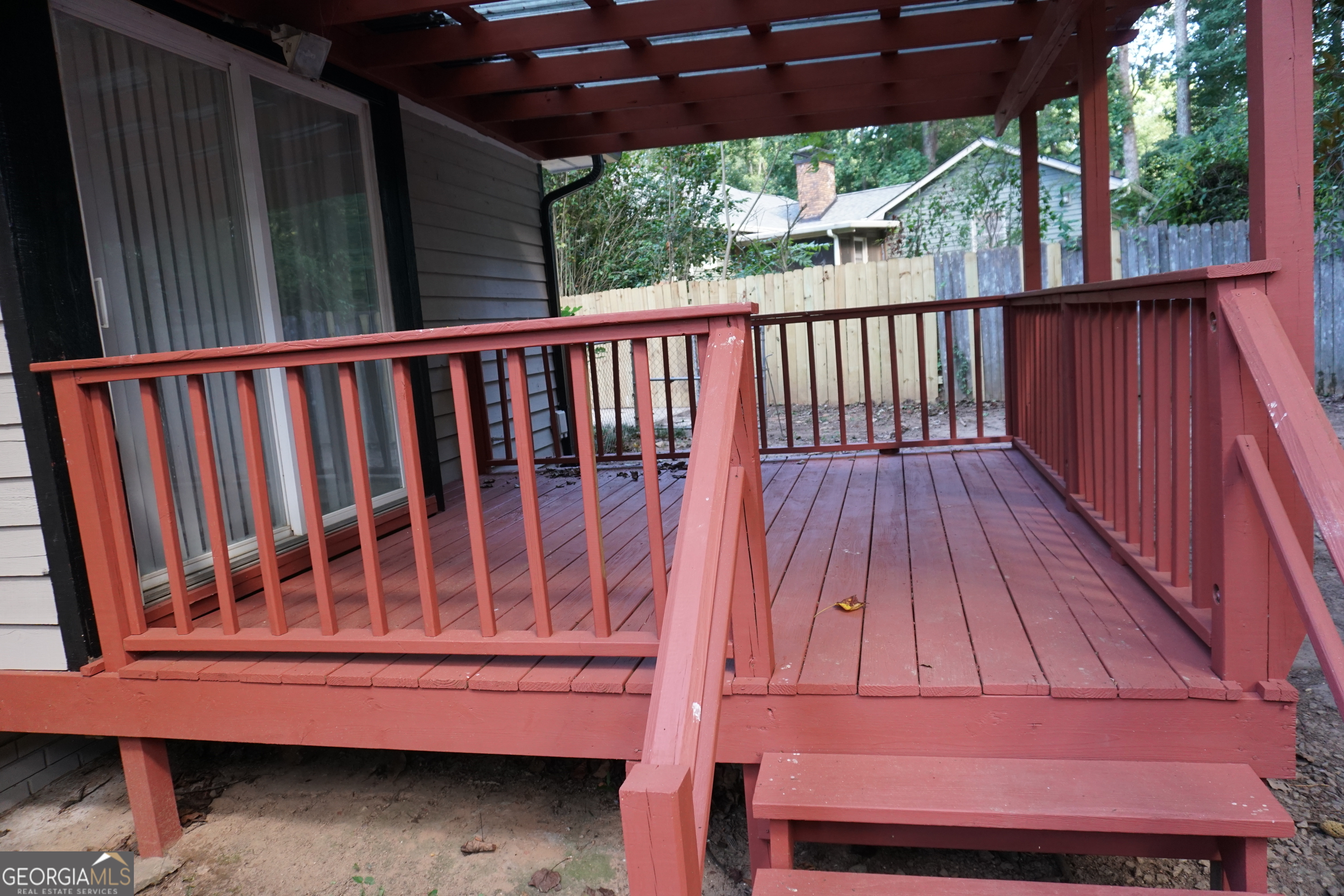9243 Seminole Road Jonesboro, GA 30236 - Photo 39 of 40 a view of porch with wooden floor