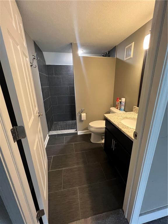 1105 Riverside Drive, Unit 2 Beaver, PA 15009 - Photo 20 of 21 a bathroom with a sink a toilet a shower and a mirror