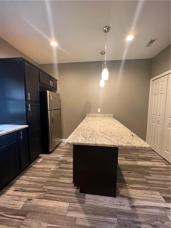 1105 Riverside Drive, Unit 2 Beaver, PA 15009 - Photo 7 of 21 a kitchen view with wooden floor and refrigerator