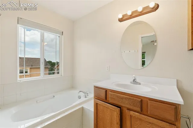 a bathroom with a sink and a bathtub