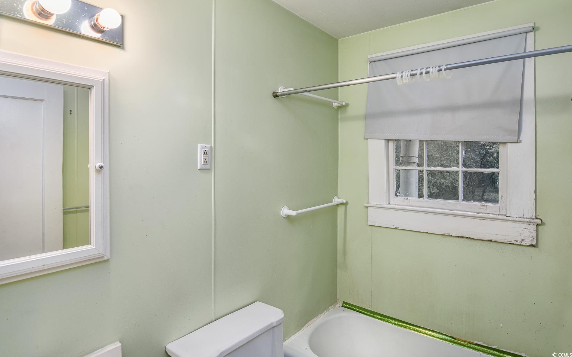 1010 Highmarket Street Georgetown, SC 29440 - Photo 29 of 32 Bathroom with shower / bath combination and toilet