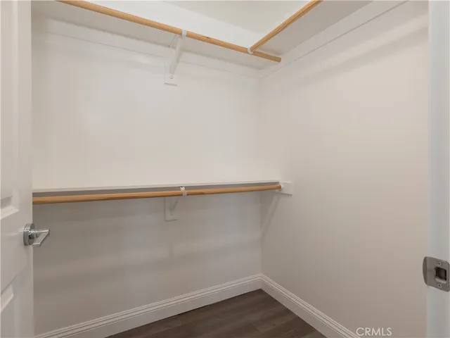 a view of an empty walk in closet