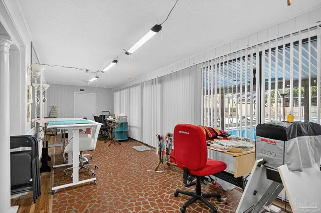 a bedroom with a bed and dresser