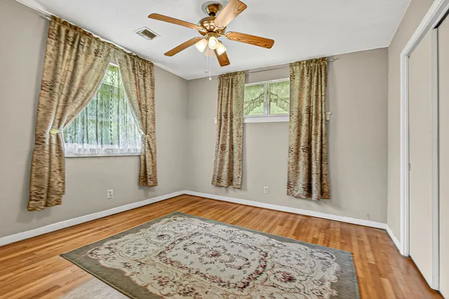 a bathroom with a sink toilet and a mirror