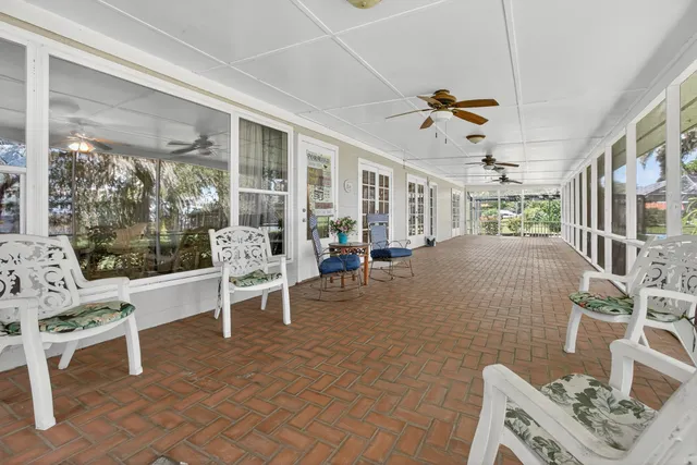 a kitchen with a stove a sink and a refrigerator