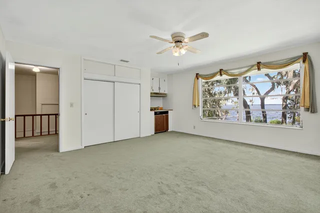 a kitchen with a stove and a table
