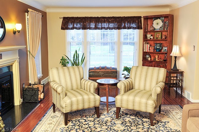 2604 Fenwick Road Cleveland, OH 44118 - Photo 4 of 19 Floor to ceiling windows in the living room let plenty of natural light in