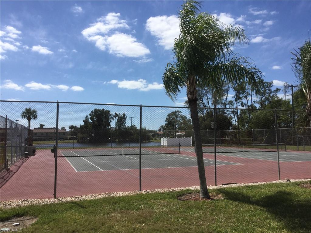 124 Versailles Circle Naples, FL 34112 - Photo 17 of 19 a view of a basketball court