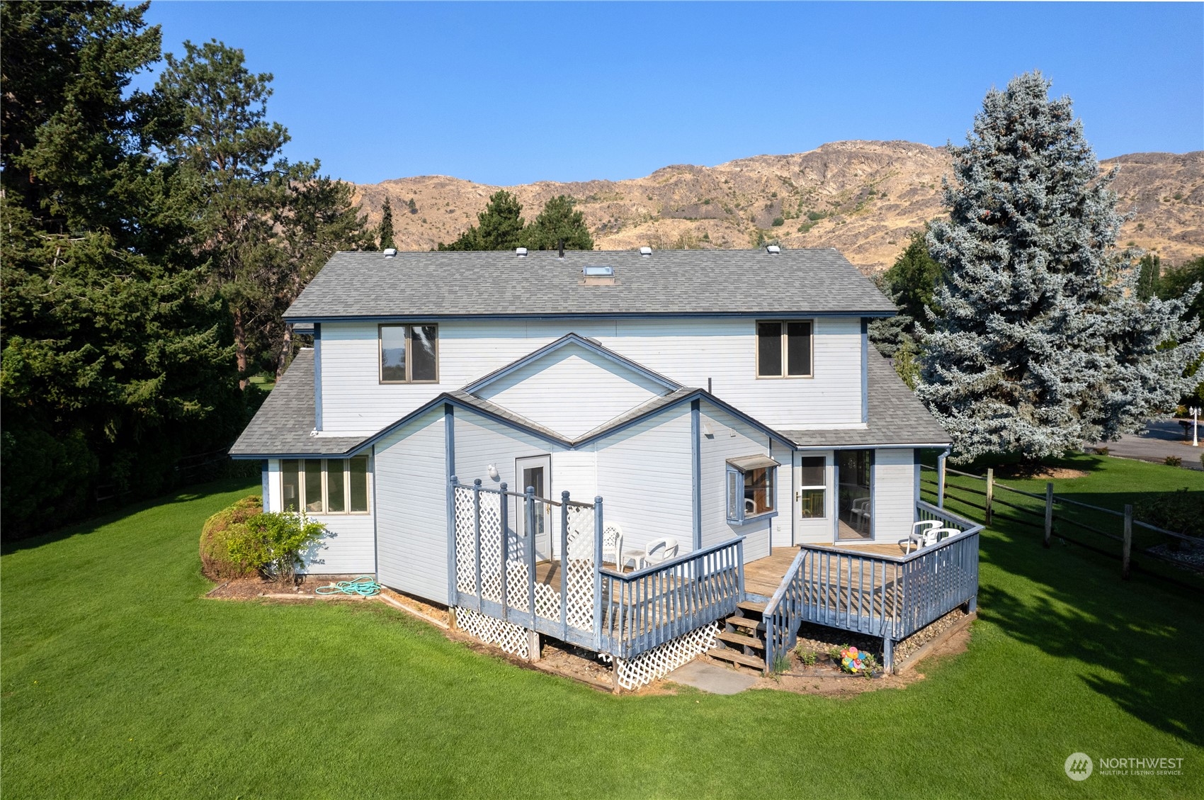 10 Pogue Road Okanogan, WA 98840 - Photo 2 of 40 a view of a house with a yard and deck