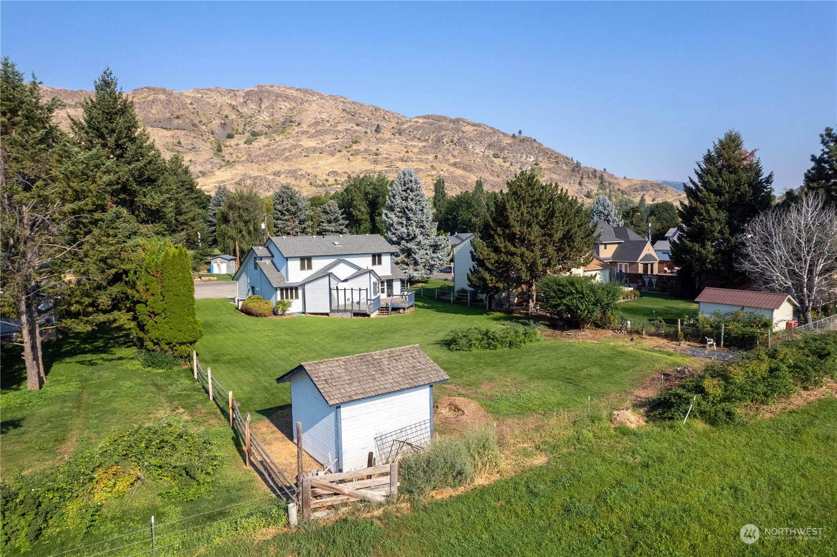 10 Pogue Road Okanogan, WA 98840 - Photo 3 of 40 an aerial view of a house with big yard