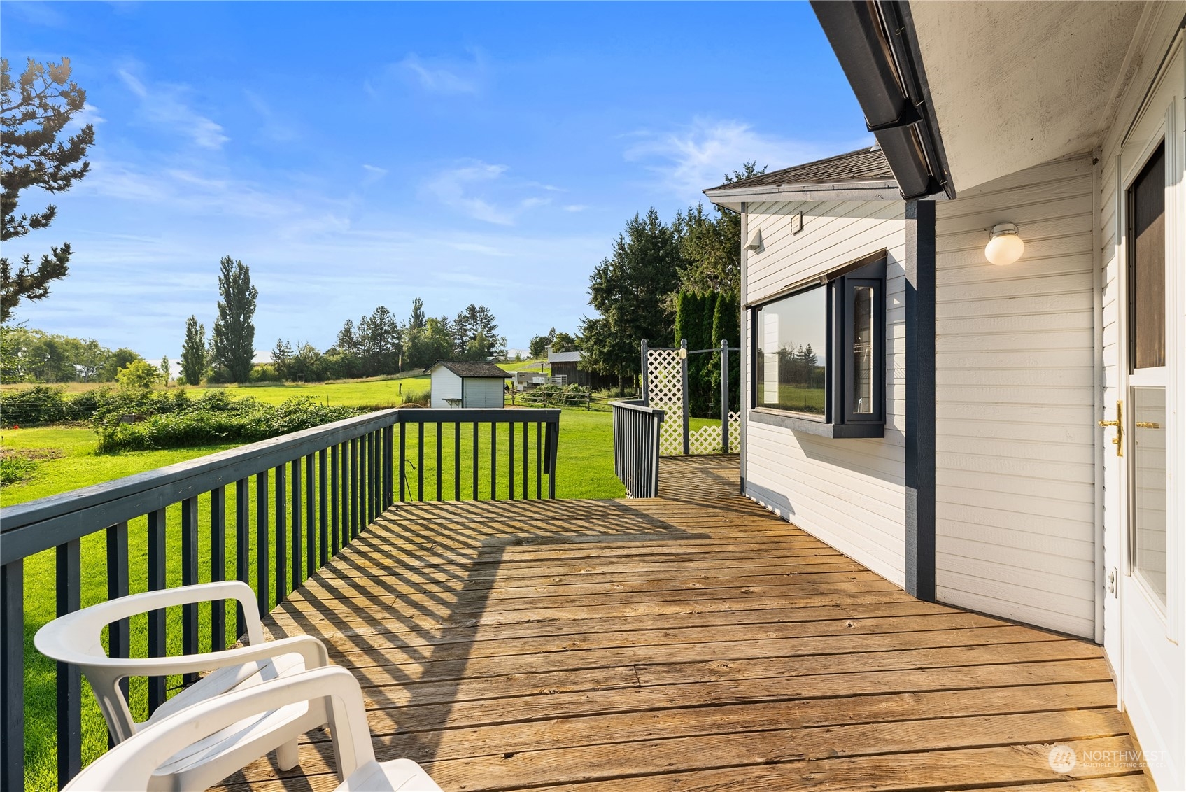 10 Pogue Road Okanogan, WA 98840 - Photo 35 of 40 a view of a balcony with wooden floor and outdoor seating