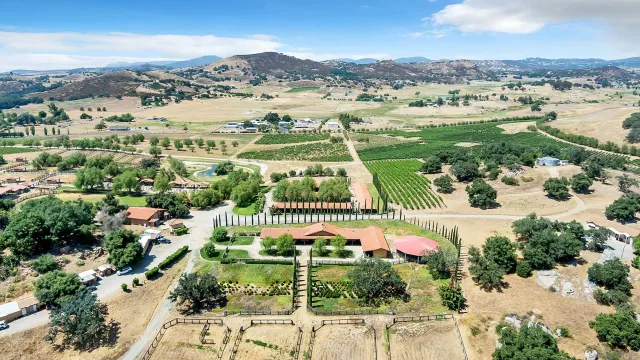 a view of a city with mountains in the background
