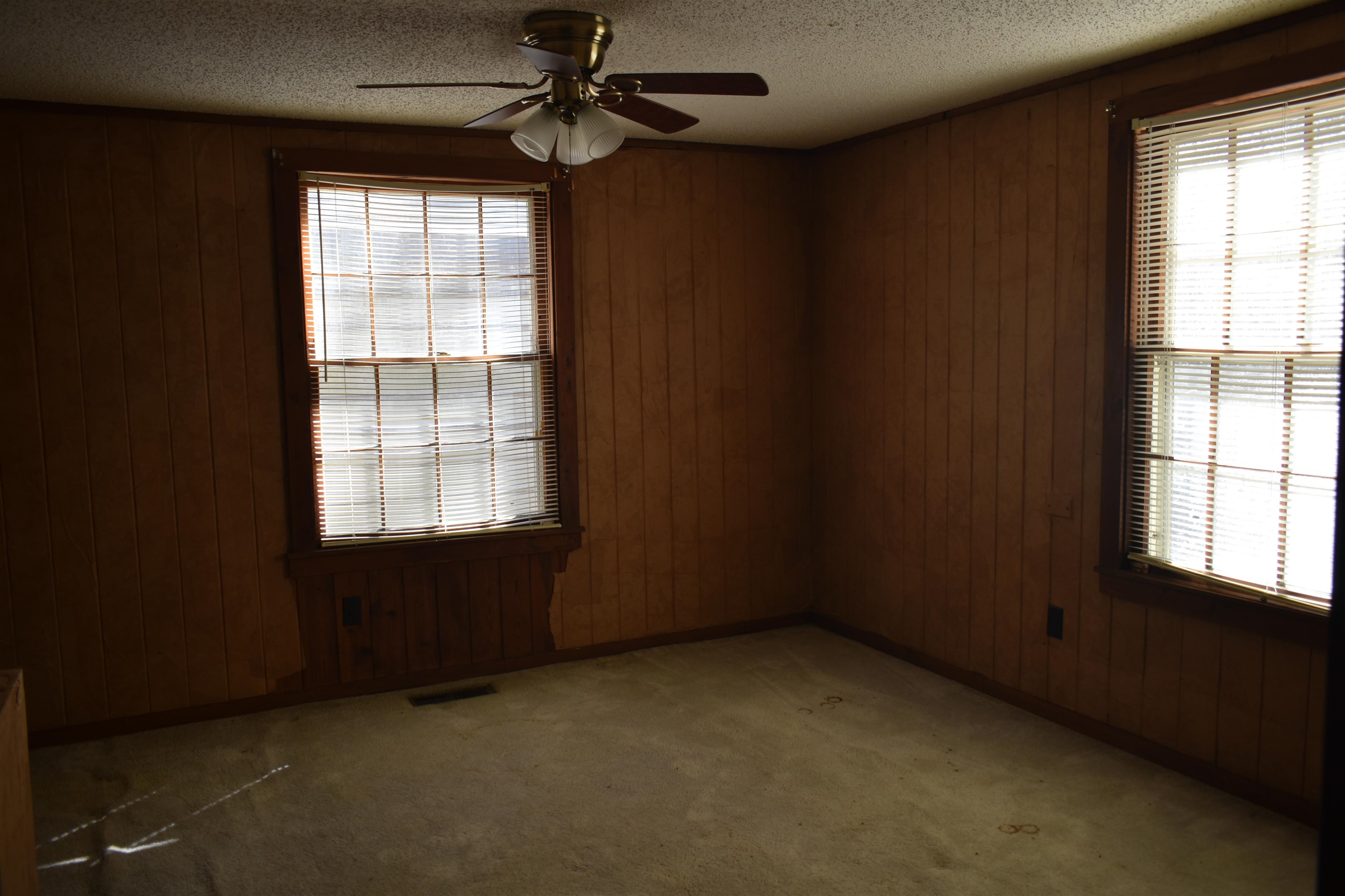 115 Falcon Street Selmer, TN 38375 - Photo 16 of 29 an empty room with a window