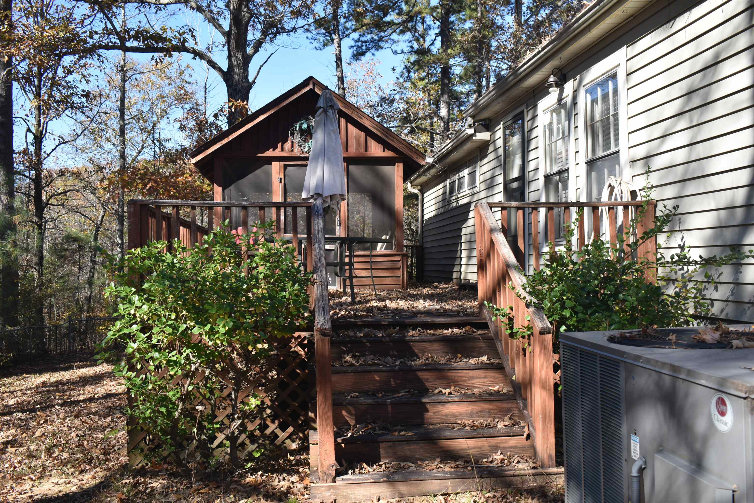 115 Falcon Street Selmer, TN 38375 - Photo 21 of 29 a front view of a house with street