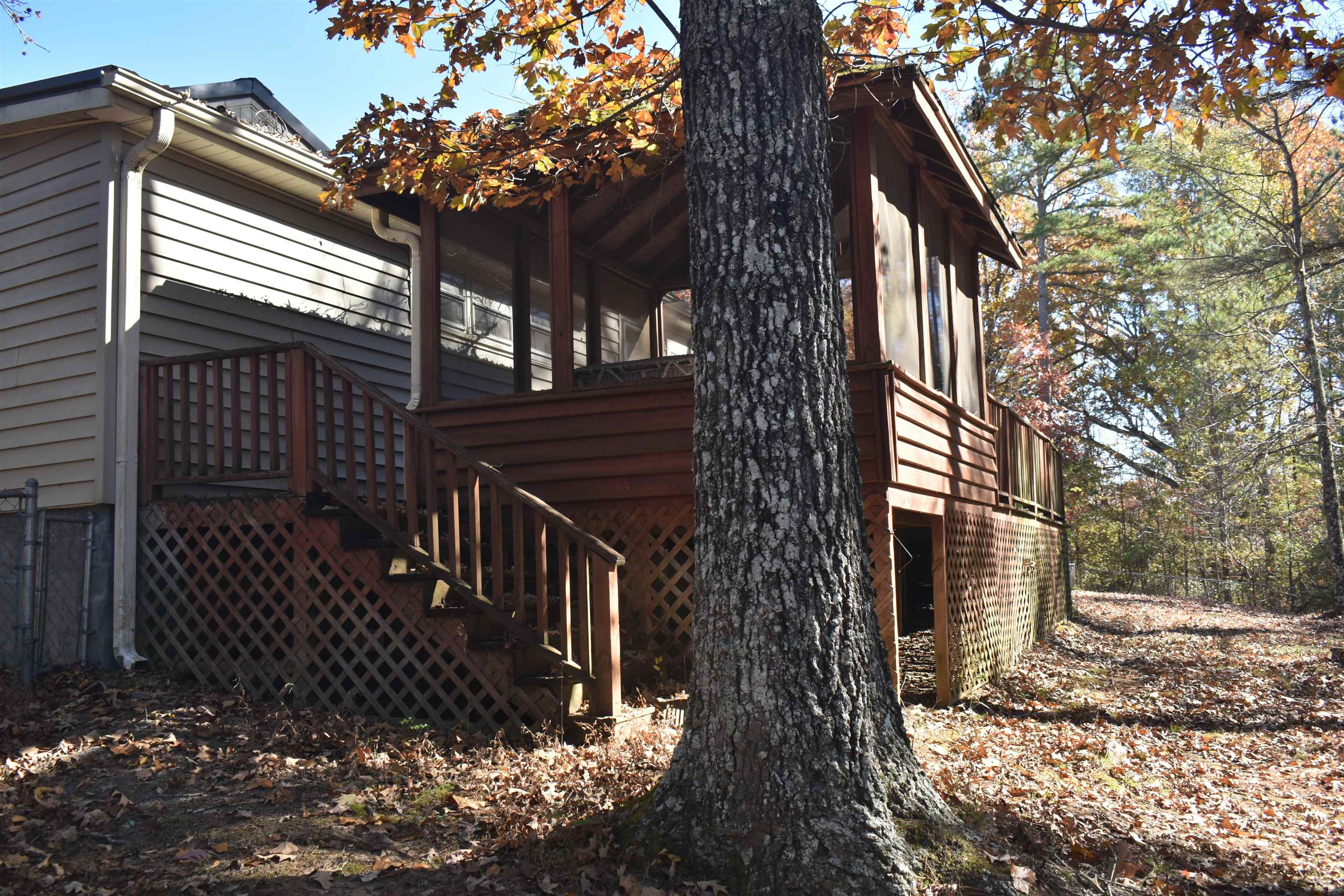 115 Falcon Street Selmer, TN 38375 - Photo 22 of 29 a view of a house with a yard