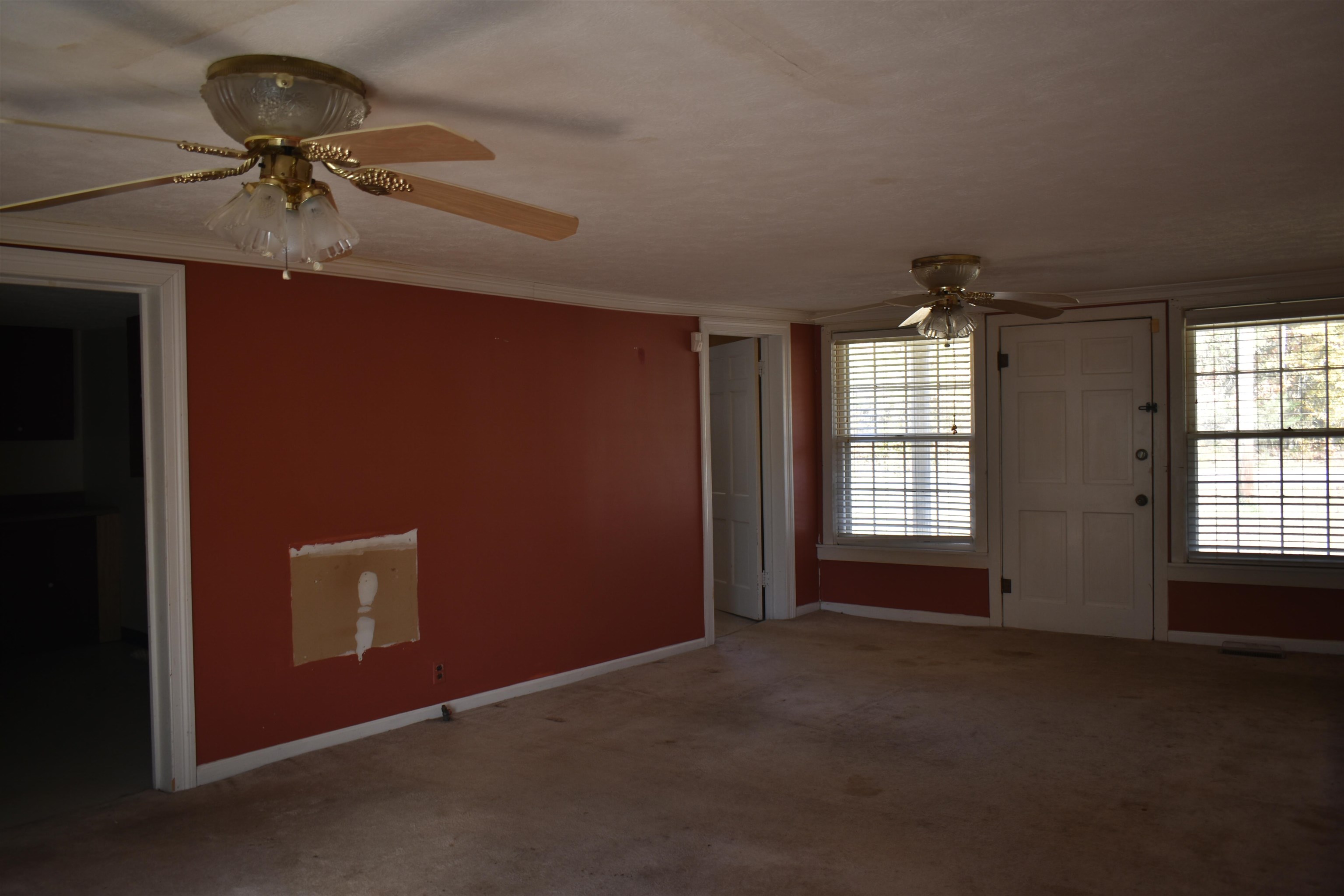 115 Falcon Street Selmer, TN 38375 - Photo 9 of 29 a view of an empty room with a window