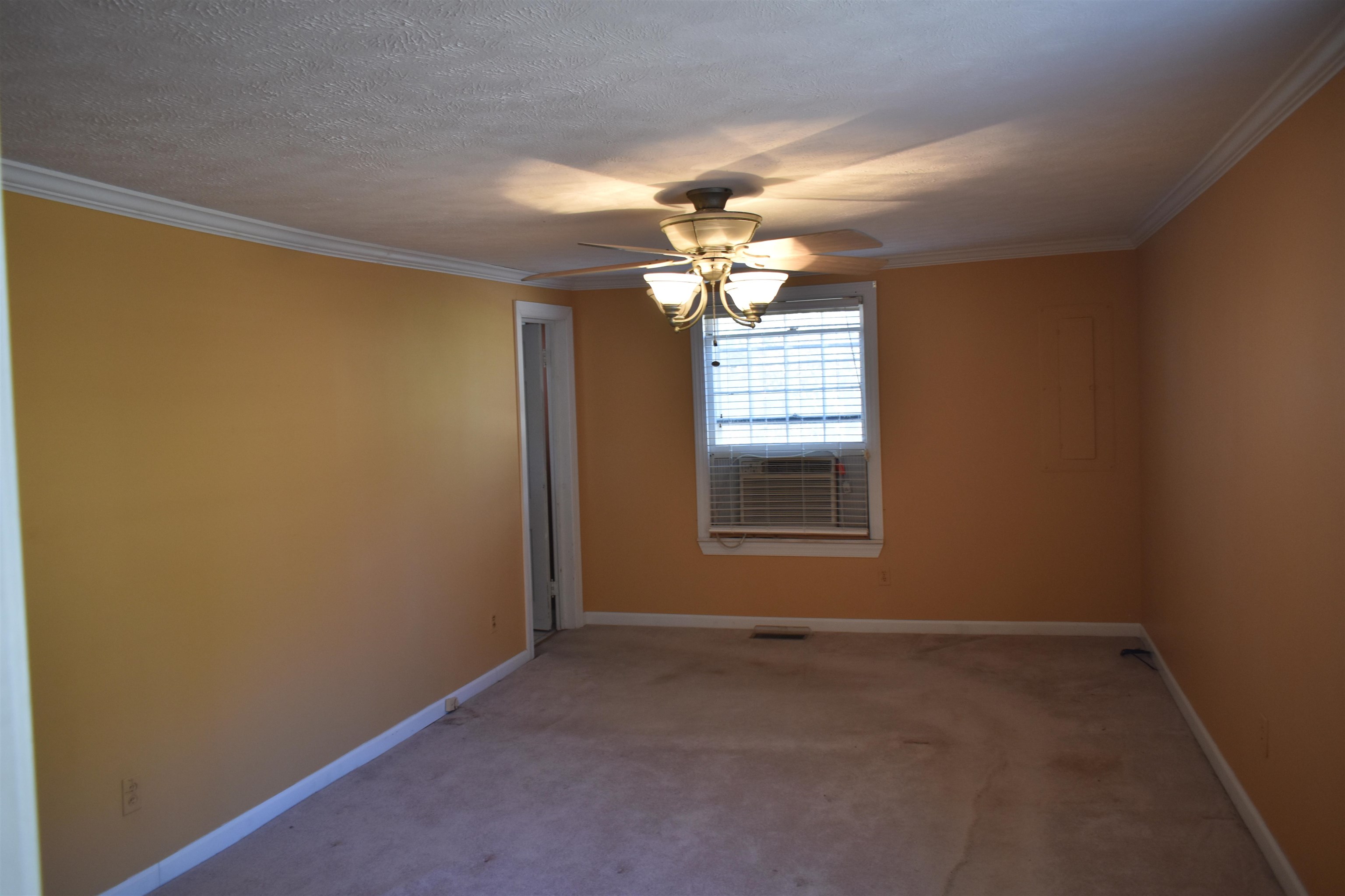 115 Falcon Street Selmer, TN 38375 - Photo 10 of 29 a view of a livingroom with a window