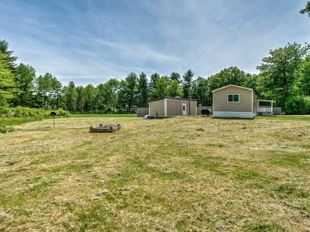 673 Hanson Road South China, ME 04358 - Photo 6 of 24 Fire pit area and over-sized out...