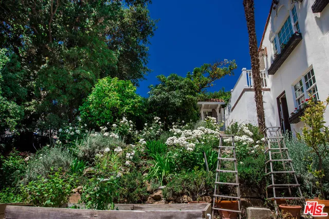a view of street with tall buildings