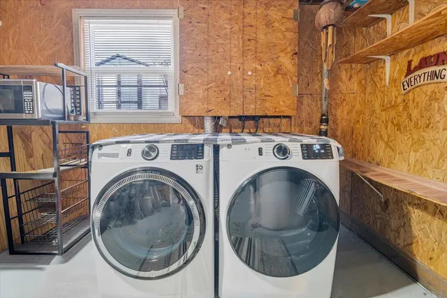 a view of a yard with a snow on the road