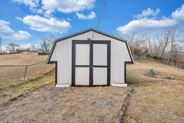 a house view with a backyard space