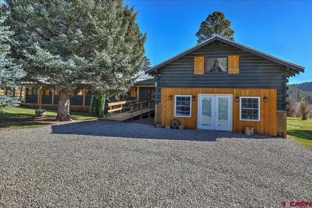 a kitchen with a stove and a refrigerator