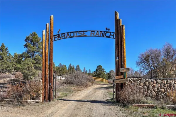 a view of a street with a building in the background