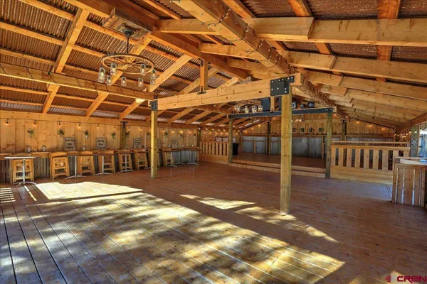 a view of a house with garden and sitting area