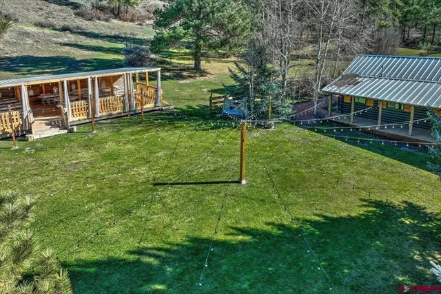 a view of a backyard of the house