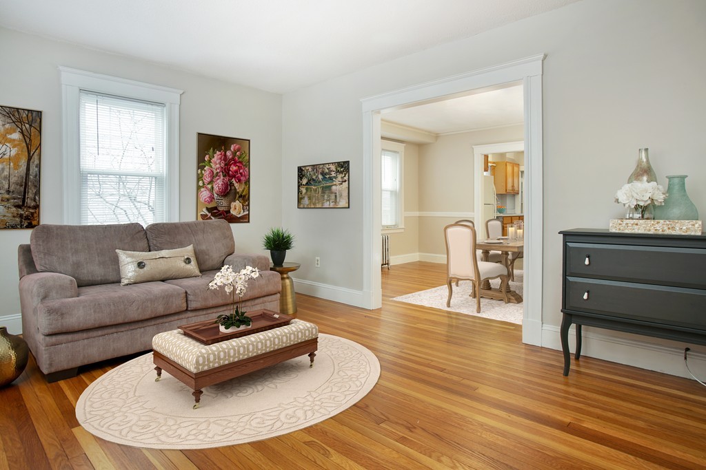 517 Heath Street Brookline, MA 02467 - Photo 2 of 12 a living room with furniture and a wooden floor