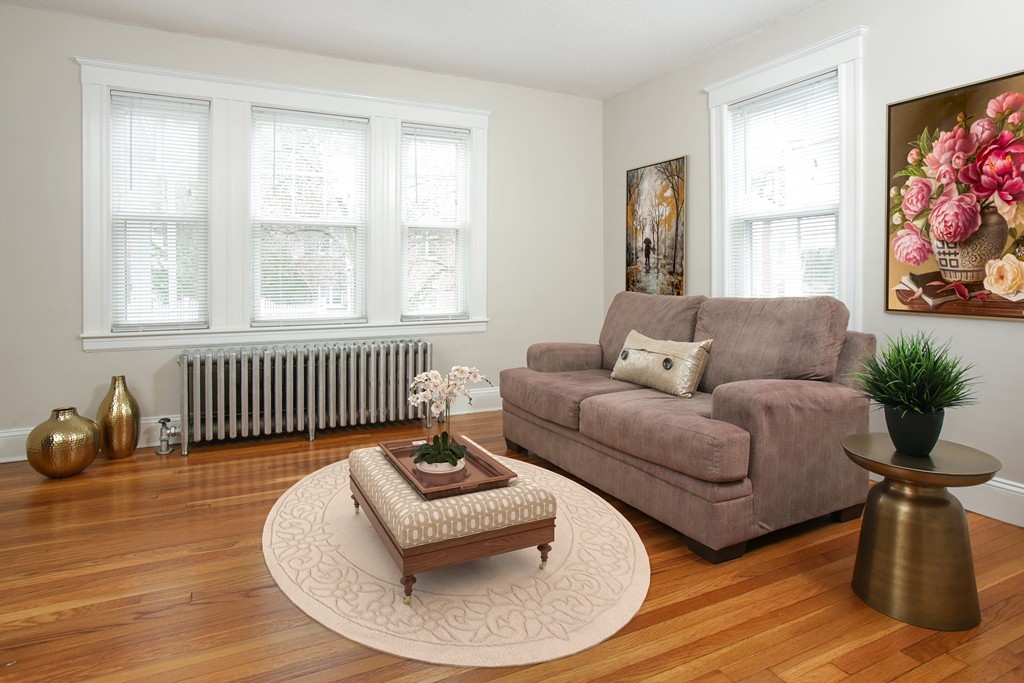 517 Heath Street Brookline, MA 02467 - Photo 3 of 12 a living room with furniture and a window