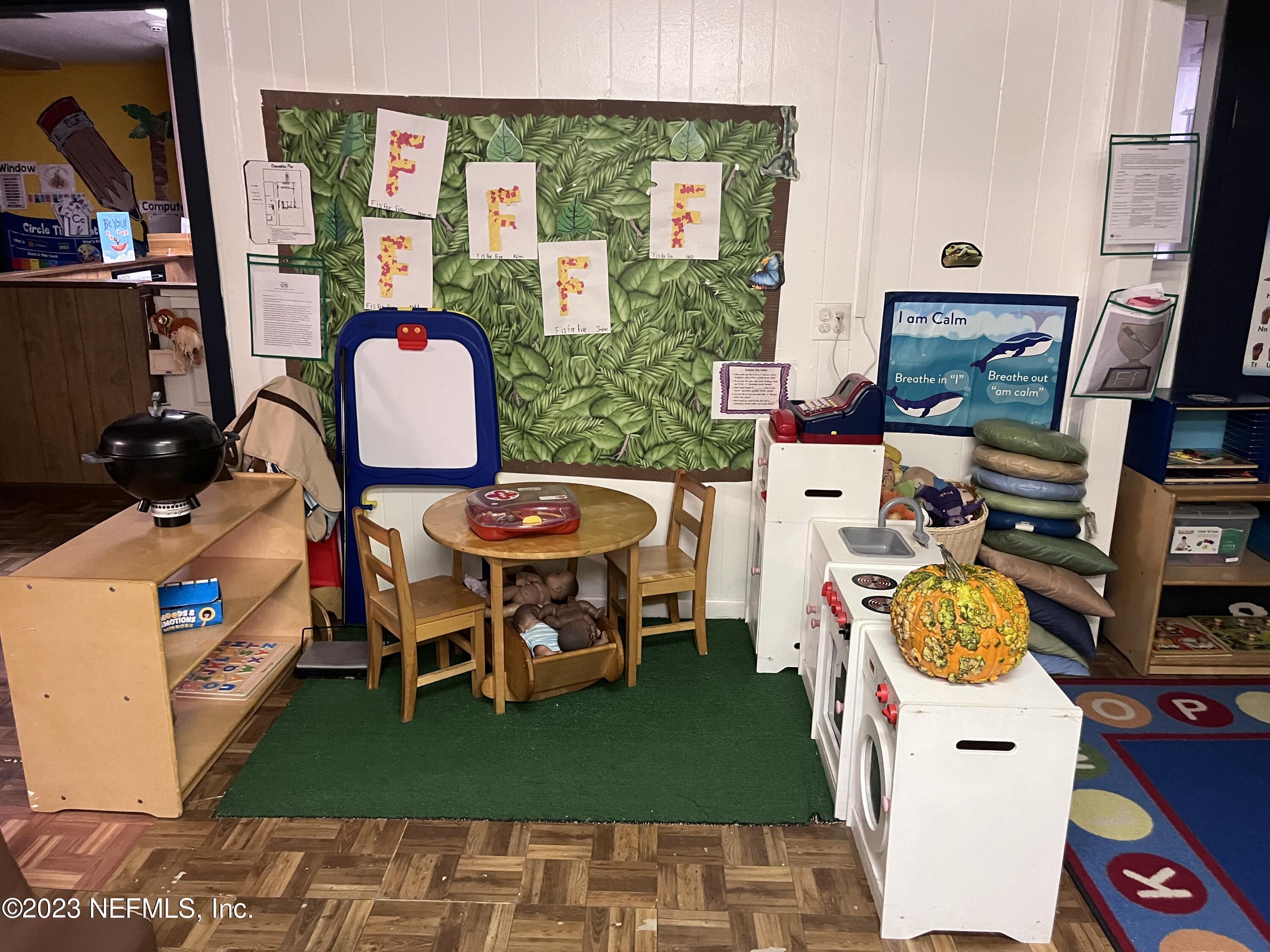 10367 Monaco Drive Jacksonville, FL 32218 - Photo 20 of 49 a living room with furniture and a rug
