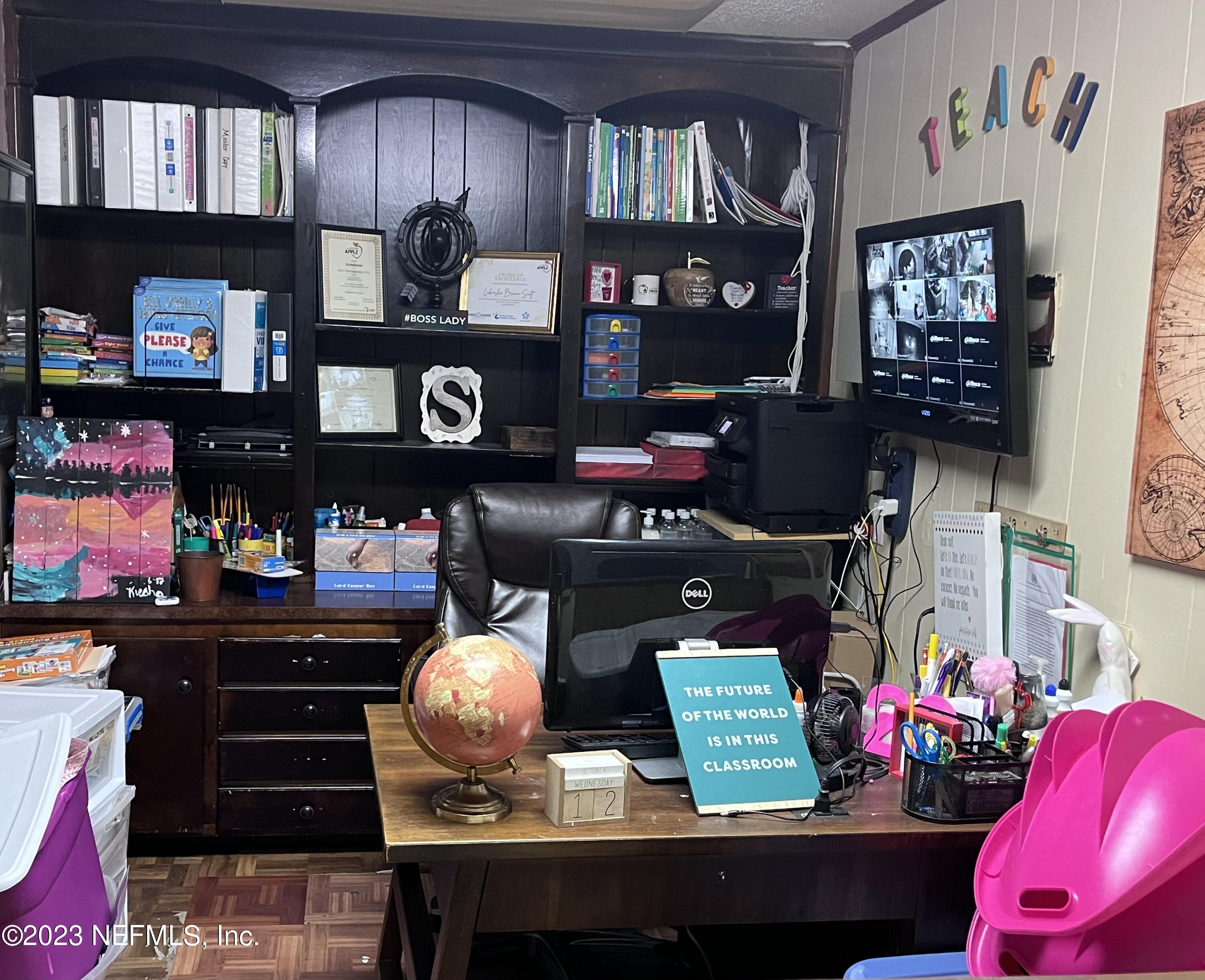 10367 Monaco Drive Jacksonville, FL 32218 - Photo 25 of 49 a room with lots of different colored cloths