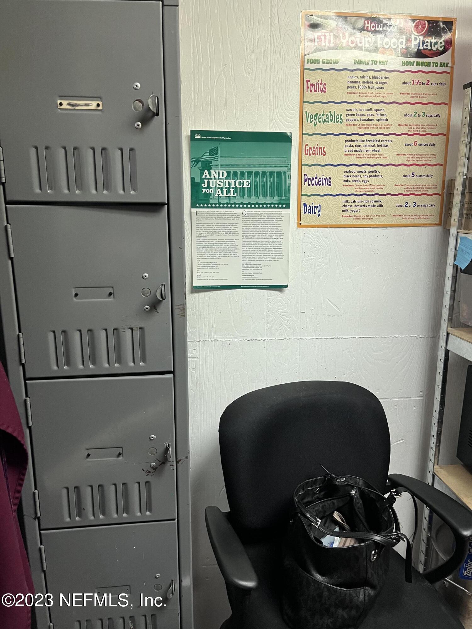 10367 Monaco Drive Jacksonville, FL 32218 - Photo 48 of 49 a view of kitchen with a chair and appliances