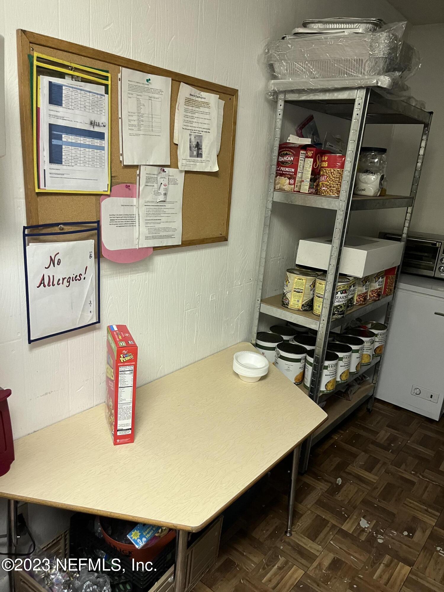 10367 Monaco Drive Jacksonville, FL 32218 - Photo 49 of 49 a room with furniture and a table