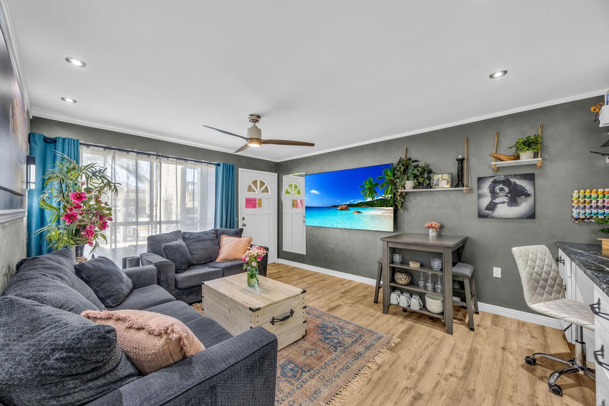 160 Keonekai Road, Unit 13102 Kihei, HI 96753 - Photo 3 of 36 a living room with furniture and wooden floor