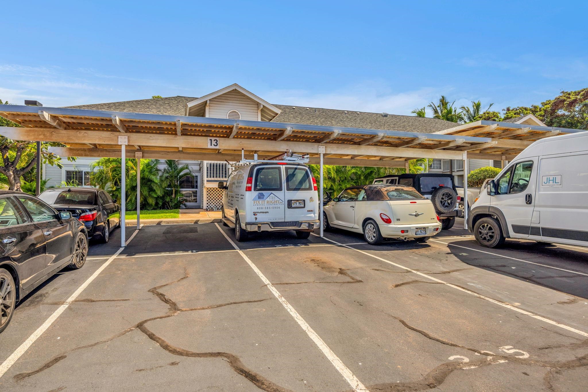 160 Keonekai Road, Unit 13102 Kihei, HI 96753 - Photo 35 of 36 a view of a cars parked in front of a building