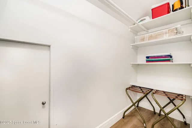 a kitchen with a sink cabinets and window
