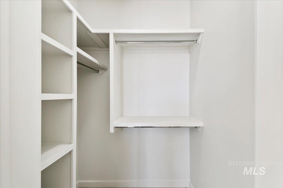 4430 East Haystack Street, Unit 109 Boise, ID 83716 - Photo 16 of 43 Walk in closet featuring carpet flooring