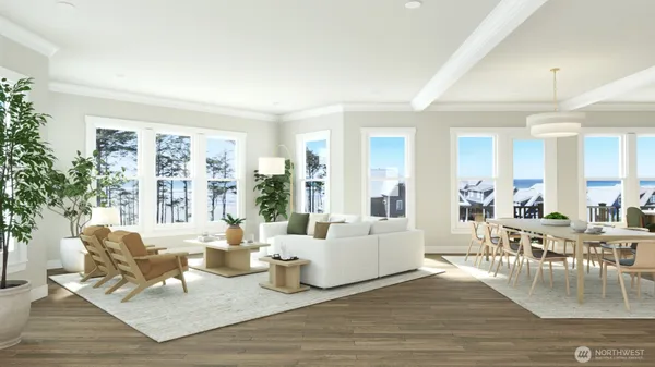 a living room with furniture large window and wooden floor