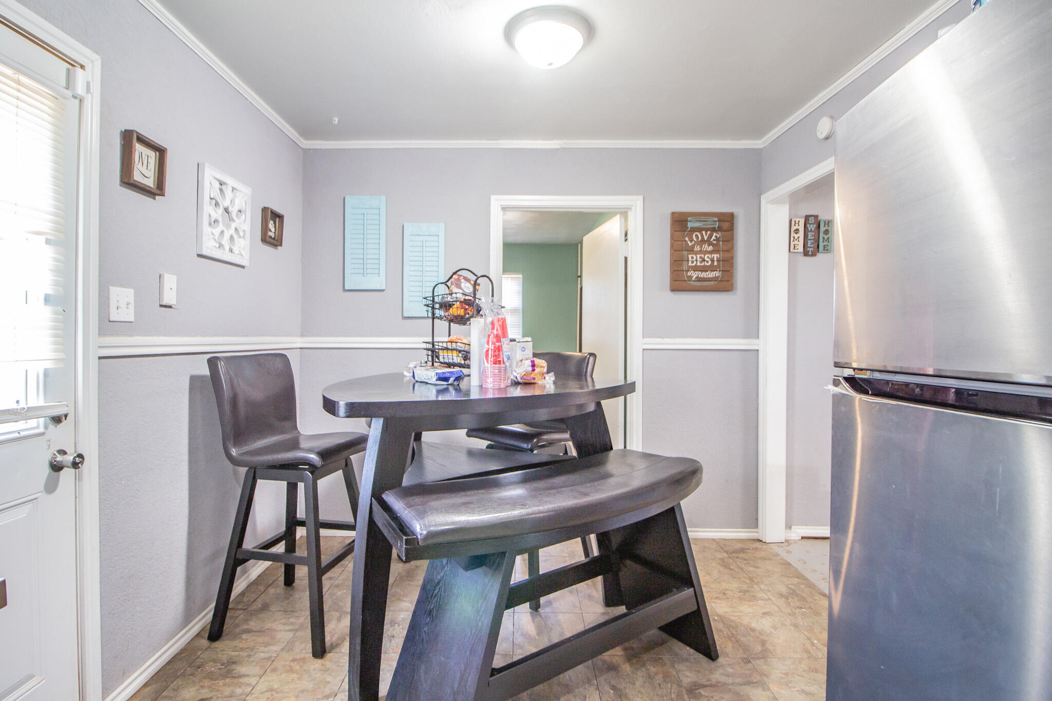 110 Ave T Levelland, TX 79336 - Photo 11 of 22 a view of a dining room with furniture