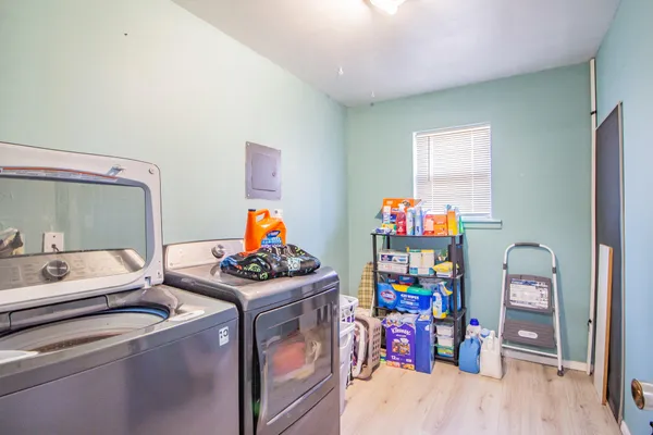 a utility room with dryer and washer