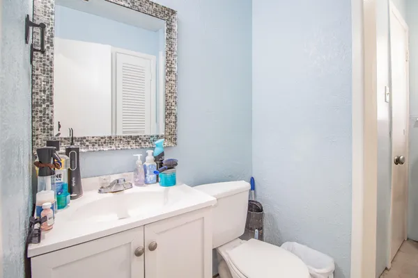 a bathroom with a sink and a toilet