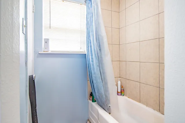 a bathroom with a bathtub