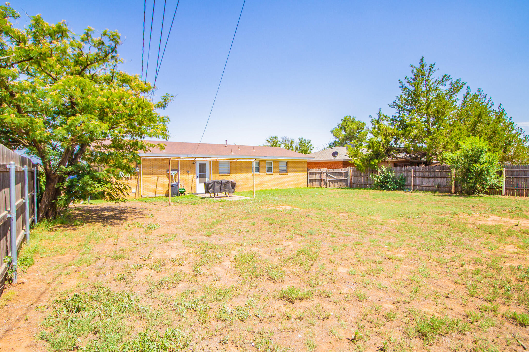 110 Ave T Levelland, TX 79336 - Photo 21 of 22 a view of swimming pool with an outdoor space and seating area