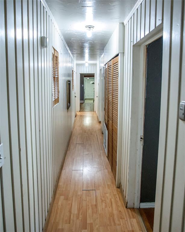 902 West Main Street Olney, TX 76374 - Photo 13 of 24 a view of gallery with wooden floor